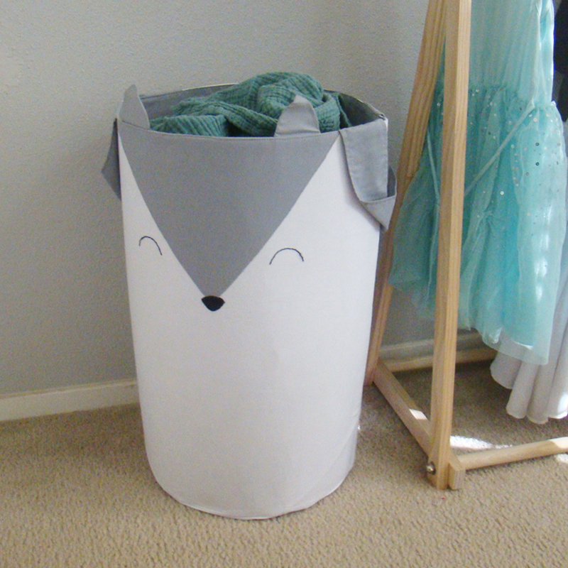 100% handmade rigid fabric baskets. With applications of animal faces and figures.